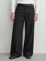 Black wide leg pleated trousers with rivet detail and relaxed tailored fit