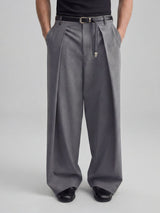Grey wide leg pleated tailored trousers for men with relaxed fit