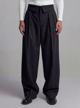 Black inverted waist tailored trousers with wide leg silhouette