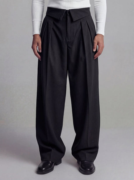 Black inverted waist tailored trousers with wide leg silhouette