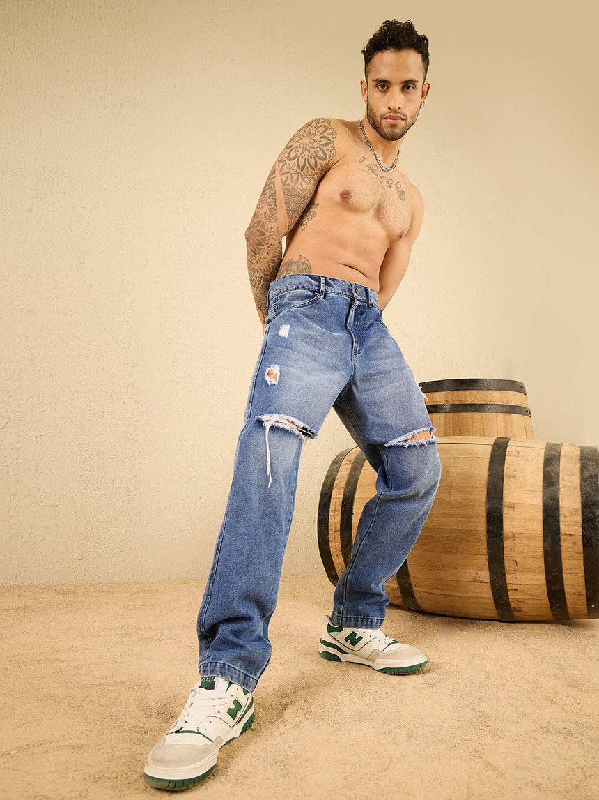 Mid Wash Blue Knee Ripped Relaxed Tapered Fit Jeans Jeans Fugazee 